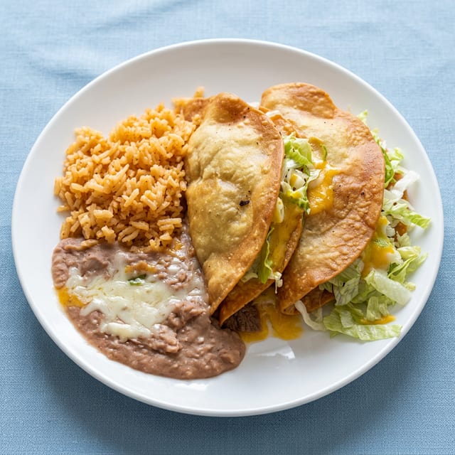 Beef Tacos with Fried Flour Shell.